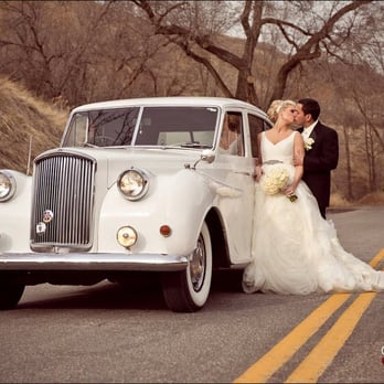 Bride and groom beside Princess Ivy with Utah mountains